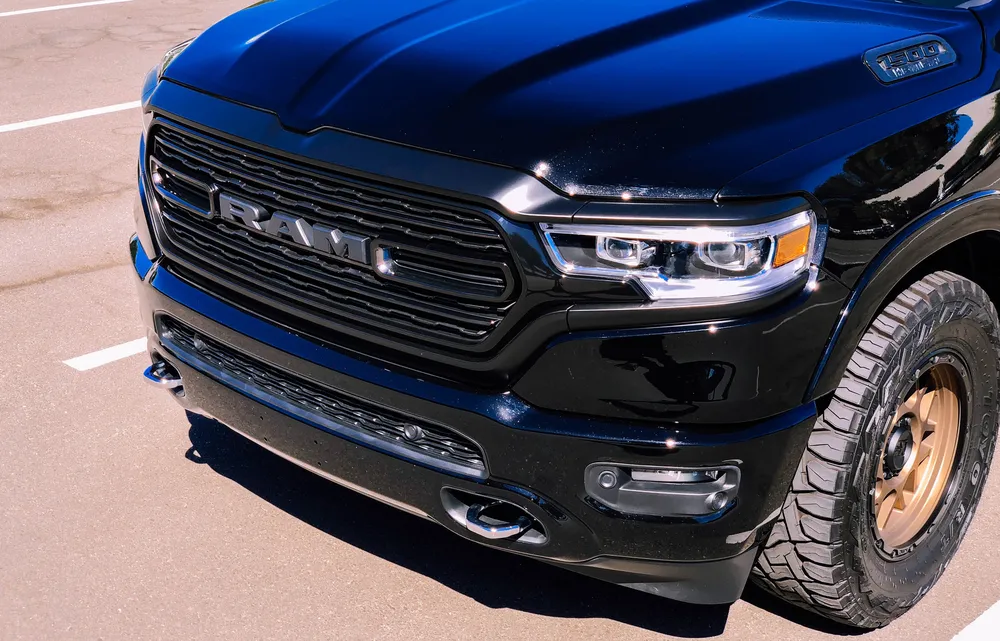 Black Ram 1500 chrome delete — blacked-out grille and trim by Vaderwerks