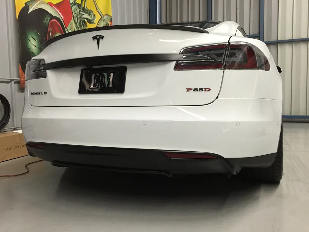 White Tesla Model S P85D chrome delete, rear blackout by Vaderwerks
