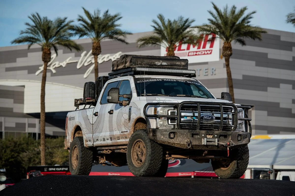 Ford Super Duty overland wrap at SEMA Las Vegas front view by Vaderwerks