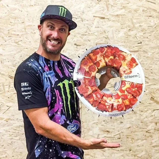 Custom pizza-design wheel wrap held in the Vaderwerks shop