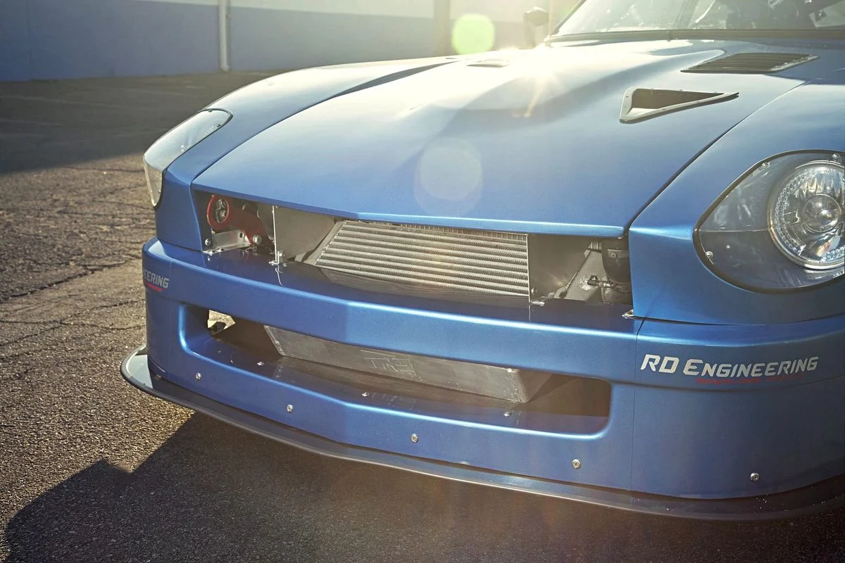 Blue Datsun 240Z wrap with front air dam by Vaderwerks