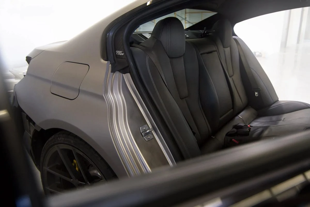 BMW interior door jamb matte wrap detail by Vaderwerks