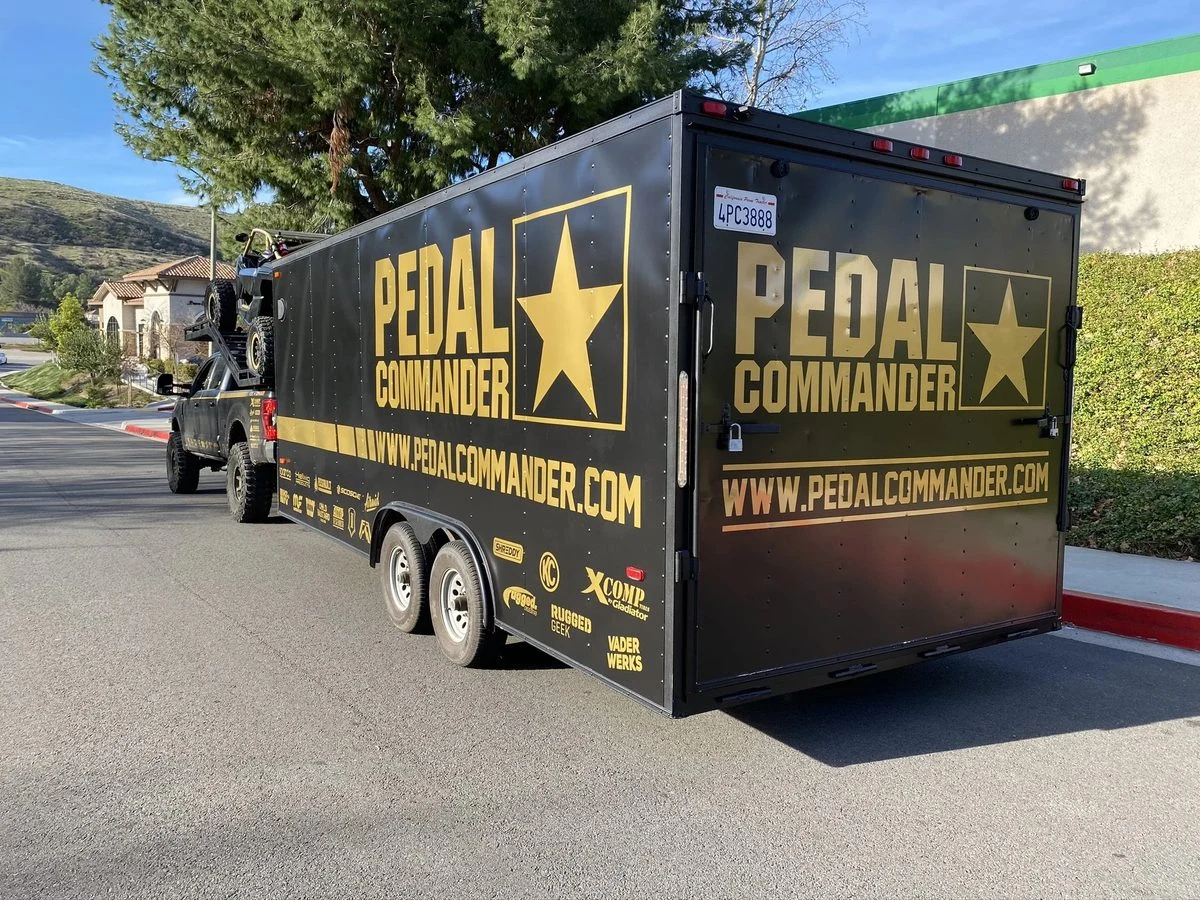 Pedal Commander black and gold commercial trailer wrap by Vaderwerks
