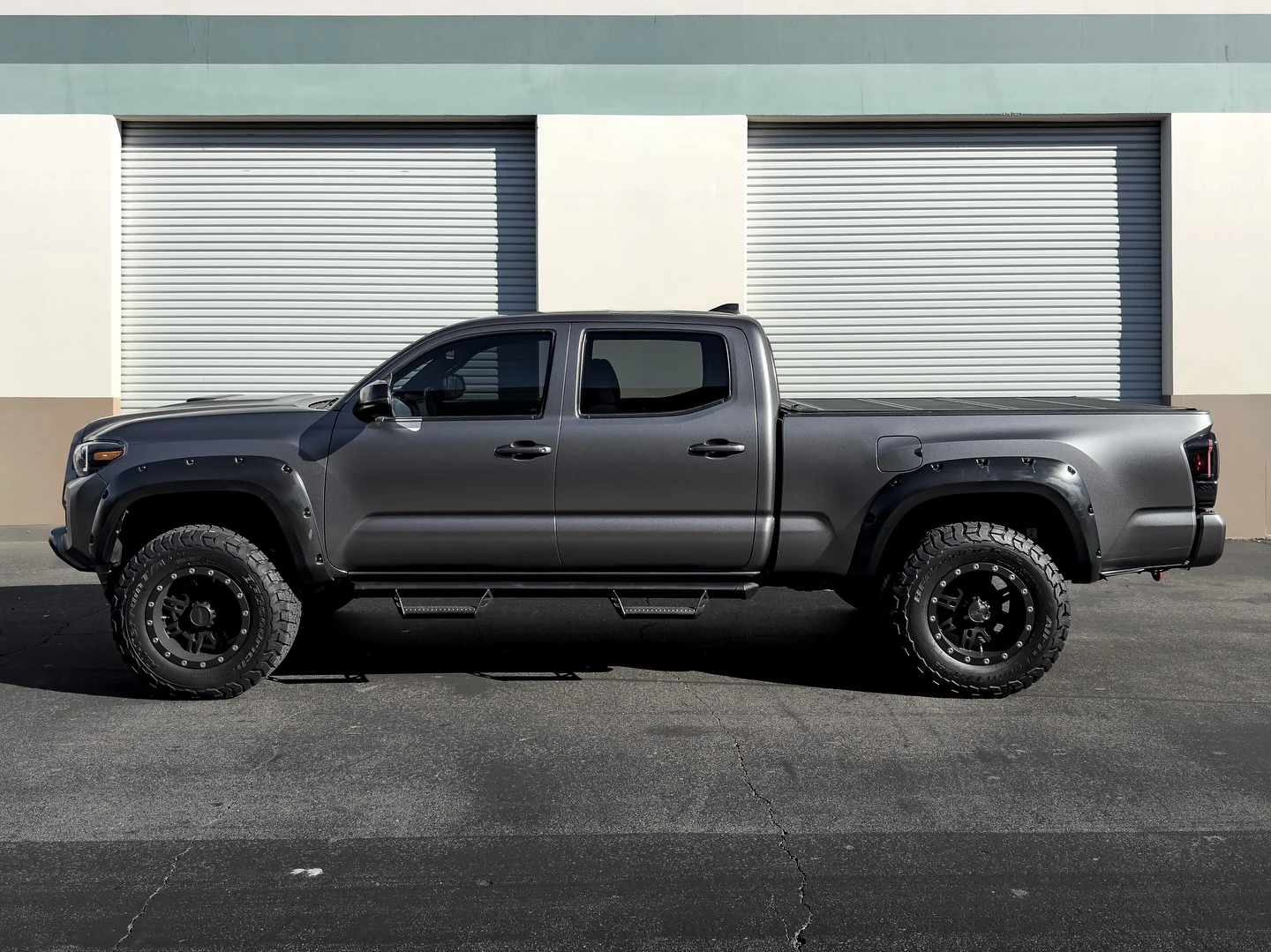 Toyota Tacoma satin grey wrap by Vaderwerks