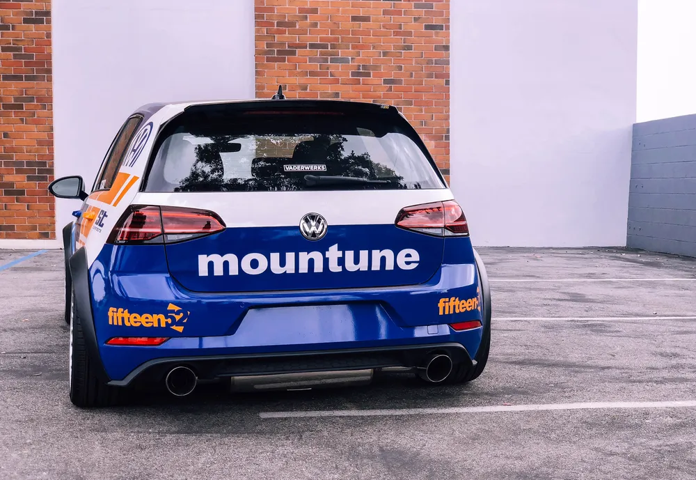 VW Golf GTI Mountune race livery, rear view with sponsor graphics