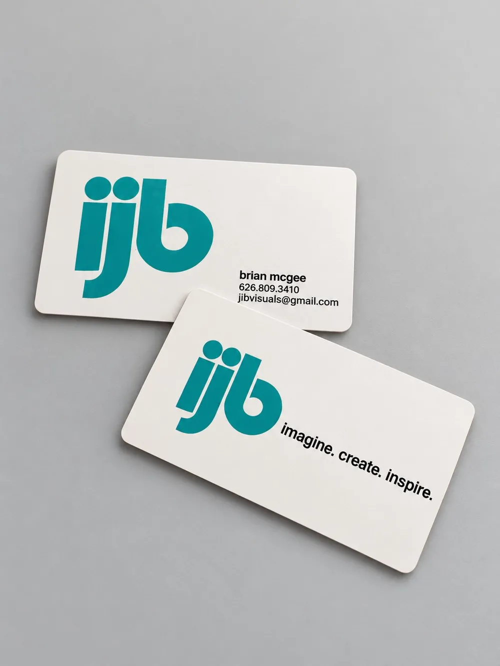 JIB Visuals business cards with teal logo, printed by Vaderwerks